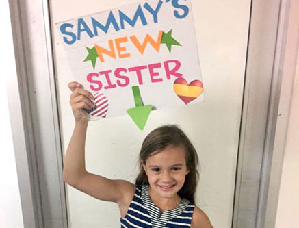Sammy's new syster